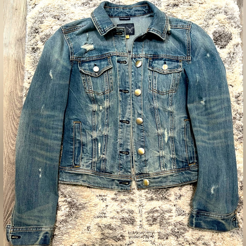 Woman’s distressed American Eagle Jean jacket